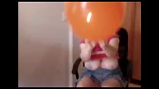 MILF Zoe Busts a Balloon with Her Ass in a Porn Movie