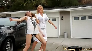 MILF and stepdaughter indulge in some hot scissoring action